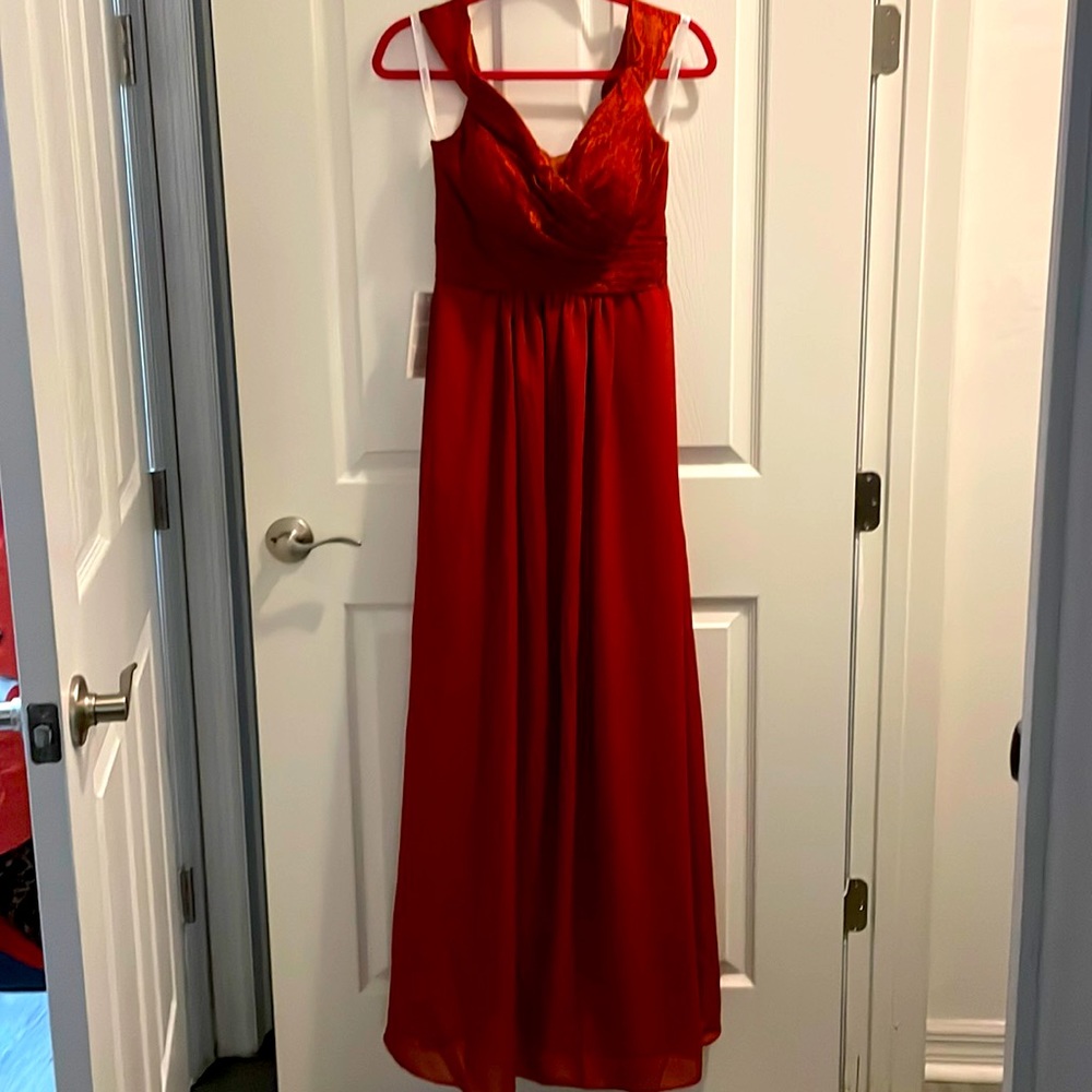 Elegant long formal dress with lace.  Bought for wedding and changed my mind.